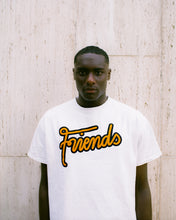 Load image into Gallery viewer, Oversized Friends Logo T-Shirt on body, portrait of man wearing